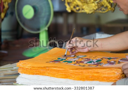 Bac Ninh, Vietnam - Sep 9, 2015: Painting is being made in workshop by craftsman in Dong Ho folk painting village