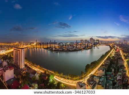 Aerial view of Hanoi skyline cityscape at twilight period. Linh Dam lake, south of Hanoi capital