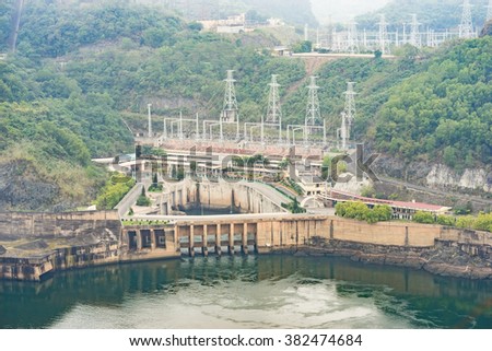 Hoa Binh, Vietnam - Jan 14, 2016: View of Hoa Binh Hydroelectricity Plant on misty day. The plant was built from 1979 with 8 machines provides 1920 MW, equal to one third of productivity of Vietnam.