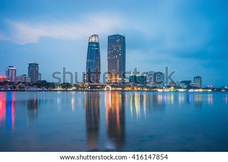 Da Nang panorama view by Han river by twilight period. Da Nang is one of the major port city in Vietnam and the biggest city in Central Vietnam