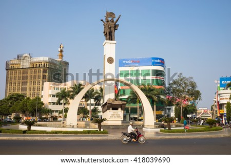 Buon Ma Thuot, Vietnam - Mar 30, 2016: Victory monument of a T-54 Tank in central point of city, crossroads of 6 roads to discover the Buon Ma Thuot city