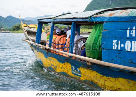 Quang Binh, Vietnam - June 16, 2016: Closeup Semi power/rowing tourism boat on river to Phong Nha cave, Phong Nha - Ke Bang national park, Quang Binh, Vietnam