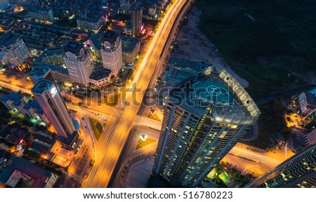 Aerial view of Hanoi cityscape at twilight period with skyscraper and intersection Pham Hung - Duong Dinh Nghe, Tu Liem district, Hanoi, Vietnam. Modern Hanoi city.