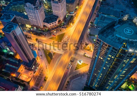 Aerial view of Hanoi cityscape at twilight period with skyscraper and intersection Pham Hung - Duong Dinh Nghe, Tu Liem district, Hanoi, Vietnam. Modern Hanoi city.