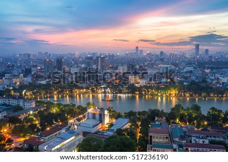Aerial skyline view of Hoan Kiem lake (Ho Guom, Sword lake) area at twilight. Hoan Kiem is center of Hanoi city. Hanoi cityscape.