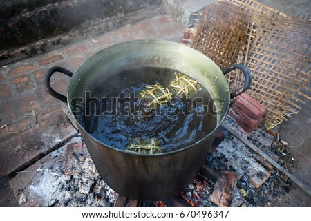 Big pot to cook Chung cake outdoor, square glutinous rice cake, Vietnamese lunar new year food