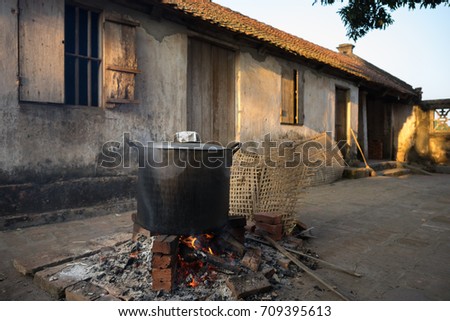 Big pot to cook Chung cake outdoor, square glutinous rice cake, Vietnamese lunar new year food
