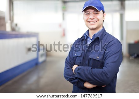 Portrait of a worker in a factory