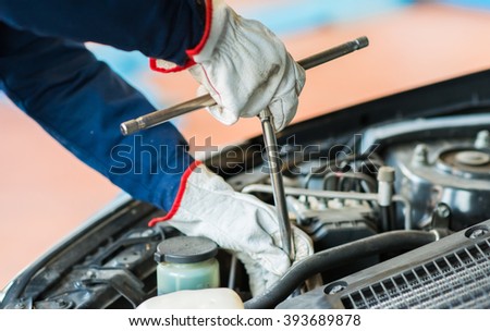 Mechanic repairing a car