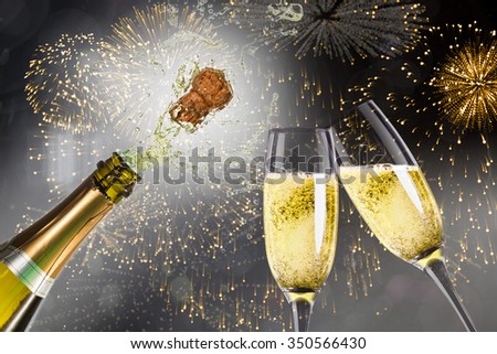 stock-photo-champagne-popping-against-colourful-fireworks-exploding-on-black-background-350566430.jpg