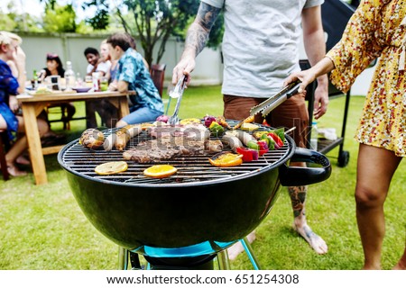 Steak barbecues cooking grilling on charcoals