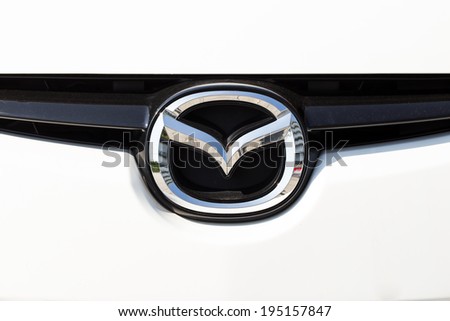 BANGKOK,THAILAND - MAY 22,2014 : Logo of the brand "Mazda" on car