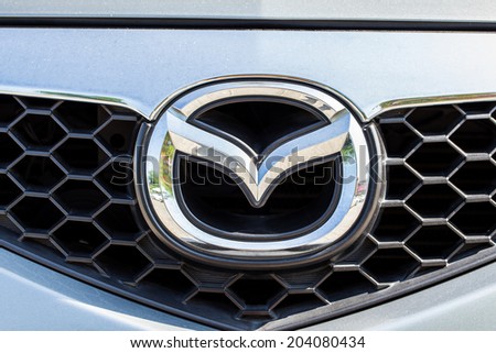 BANGKOK,THAILAND - MAY 22,2014 : Logo of the brand "Mazda" on car