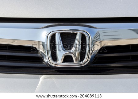 BANGKOK,THAILAND - MAY 22,2014 : Logo of the brand "Honda" on car