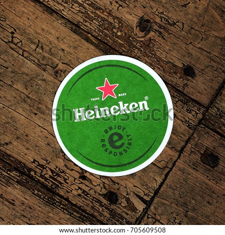 AMELAND, DUTCH - 26 AUGUST 2017.: Beer mat HEINEKEN, it was first brewed by Gerard Adriaan Heineken in 1873