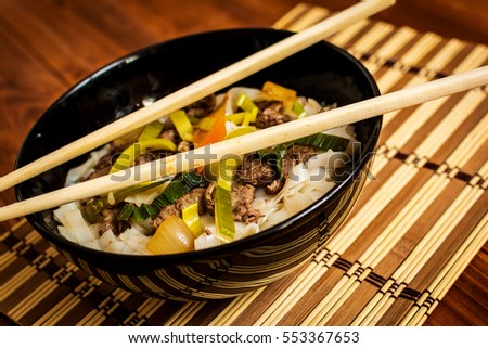 Vietnamese soup pho bo with asian noodles and beef meat