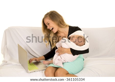 https://thumb1.shutterstock.com/display_pic_with_logo/217465/361105334/stock-photo-a-business-woman-working-on-her-laptop-holding-her-sleeping-baby-in-her-arms-361105334.jpg