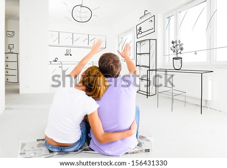 couple at their new empty apartment