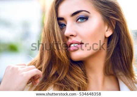 https://thumb1.shutterstock.com/display_pic_with_logo/2237975/534648358/stock-photo-close-up-fashionable-portrait-of-attractive-sensual-sexy-woman-touching-her-hair-magnificent-smile-534648358.jpg