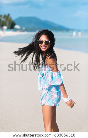 https://thumb1.shutterstock.com/display_pic_with_logo/2237975/633056510/stock-photo-lifestyle-summer-tropical-portrait-pf-pretty-thai-asian-girl-having-fun-on-california-beach-633056510.jpg