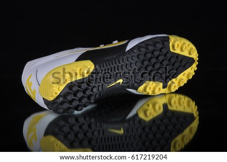 Afife, Portugal - April 8, 2017: Nike Running boots. Nike, multinational company. Isolated on Black. Product shots
