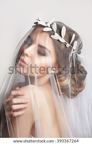 https://thumb1.shutterstock.com/display_pic_with_logo/2249345/390367264/stock-photo-beautiful-bride-with-fashion-wedding-hairstyle-on-white-background-closeup-portrait-of-young-390367264.jpg