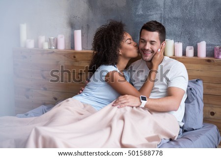 https://thumb1.shutterstock.com/display_pic_with_logo/2270597/501588778/stock-photo-beautiful-girl-kissing-her-boyfriend-in-bed-501588778.jpg