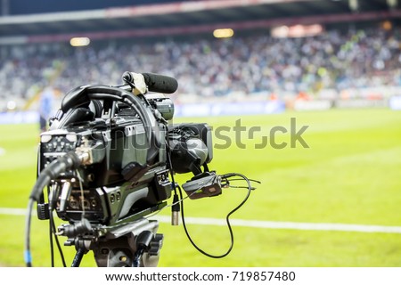 TV camera at the stadium during football matches