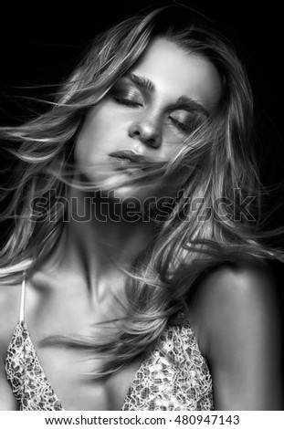 Black and white portrait of beauty young woman in summer casual dress with shaggy hair on Black and white portrait of beauty young woman in summer casual dress with shaggy hair on