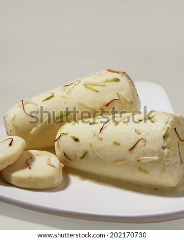 Kulfi, An Indian ice cream in plate, India - stock photo