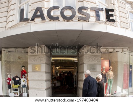 BERLIN, GERMANY - MAY 30, 2014: Lacoste store in Berlin.Lacoste is a French clothing company that sells high-end clothing, footwear, perfume, leather goods, watches, eyewear, and polo shirts.