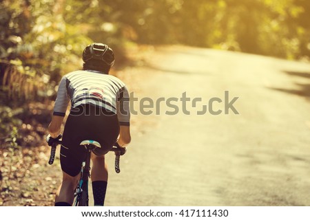 Asian men are cycling road bike in the morning
