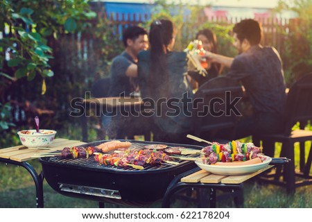 Dinner party, barbecue and roast pork at night