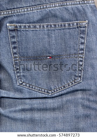 NEW YORK, USA - CIRCA JANUARY 2017: Tommy Hilfiger blue jeans detail of a back pocket with logo