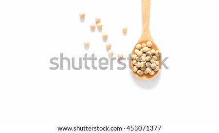 Soy bean in spoon on white background.
