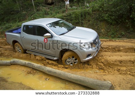 Tuyen Quang, Viet Nam - April 23, 2015: Nissan NP300 Navara running on the mud road in Vietnam