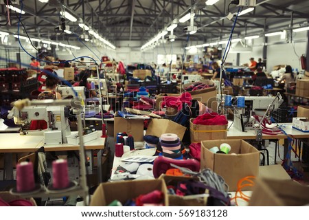 Industrial busy sewing workplace