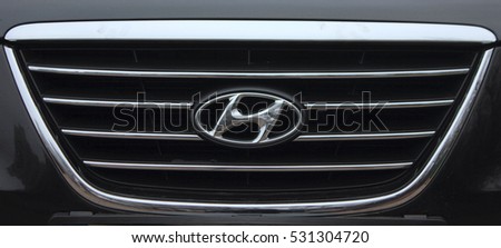 KIEV, UKRAINE - NOVEMBER 24, 2016: Front view of black Hyundai Sonata car. Hyundai is a famous worldwide car company.