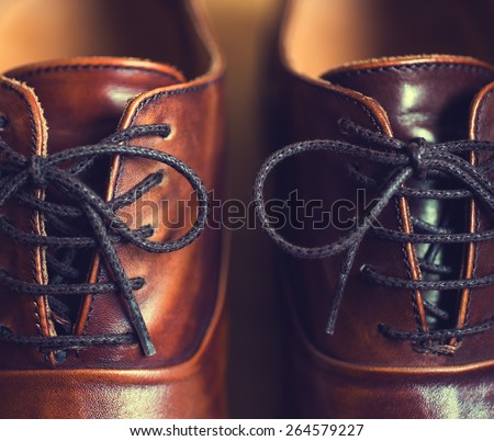Close up of brown leather men's shoes