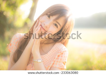 Outdoor portrait of a beautiful teenage asian girl vintage and retro tone, soft focus.