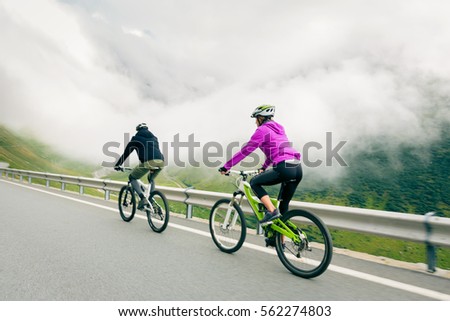 Young Couple Cycling