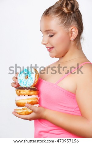 Fat girl eating donuts