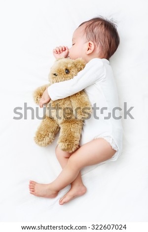 My Best Friend, Baby sleeping with her teddy bear (Soft focus and blurry)