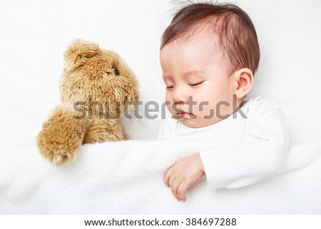 My Best Friend, Baby sleeping with her teddy bear (Soft focus and blurry)