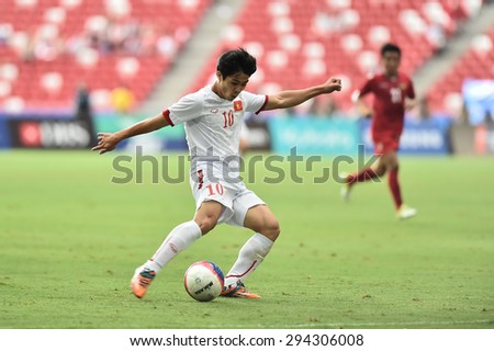 Kallang,Singapore - JUNE 13:NGUYEN Cong Phuong of Vietnam in action during the 28th SEA Games Singapore 2015 match between Vietnam and Myanmar at Singapore National Stadium on JUNE13 2015