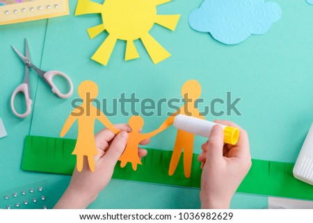International Family Day Paper Collage Kid Is Making An Art Work Of Colored International Family Day Paper Collage Kid Is Making An Art Work Of Colored