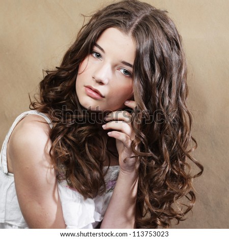 https://thumb1.shutterstock.com/display_pic_with_logo/251191/113753023/stock-photo-amazing-portrait-of-beautiful-young-woman-with-curly-hair-close-up-face-studio-photo-113753023.jpg