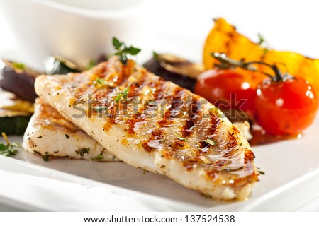 Grilled Fish Fillet with BBQ Vegetables - stock photo