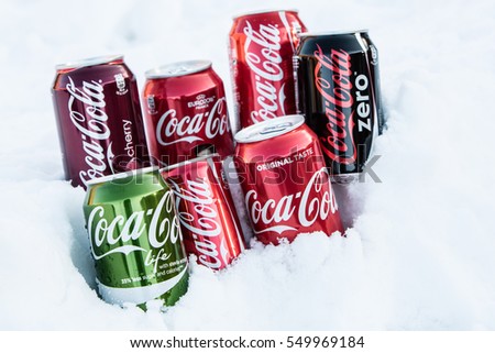 Lodz, Poland, January 06, 2017: Editorial photo of Classic Coca Cola can, Life, Cherry, Zero, Coca-Cola Company is the most popular market leader carbonated soft drink, Selective focus
