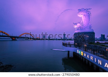 DANANG, VIETNAM, MAY 08, 2015. water breathing dragon and Dragon River Bridge ( Rong Bridge) in Da Nang, Vietnam